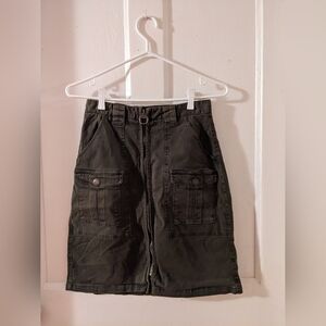 Dark green mini skirt